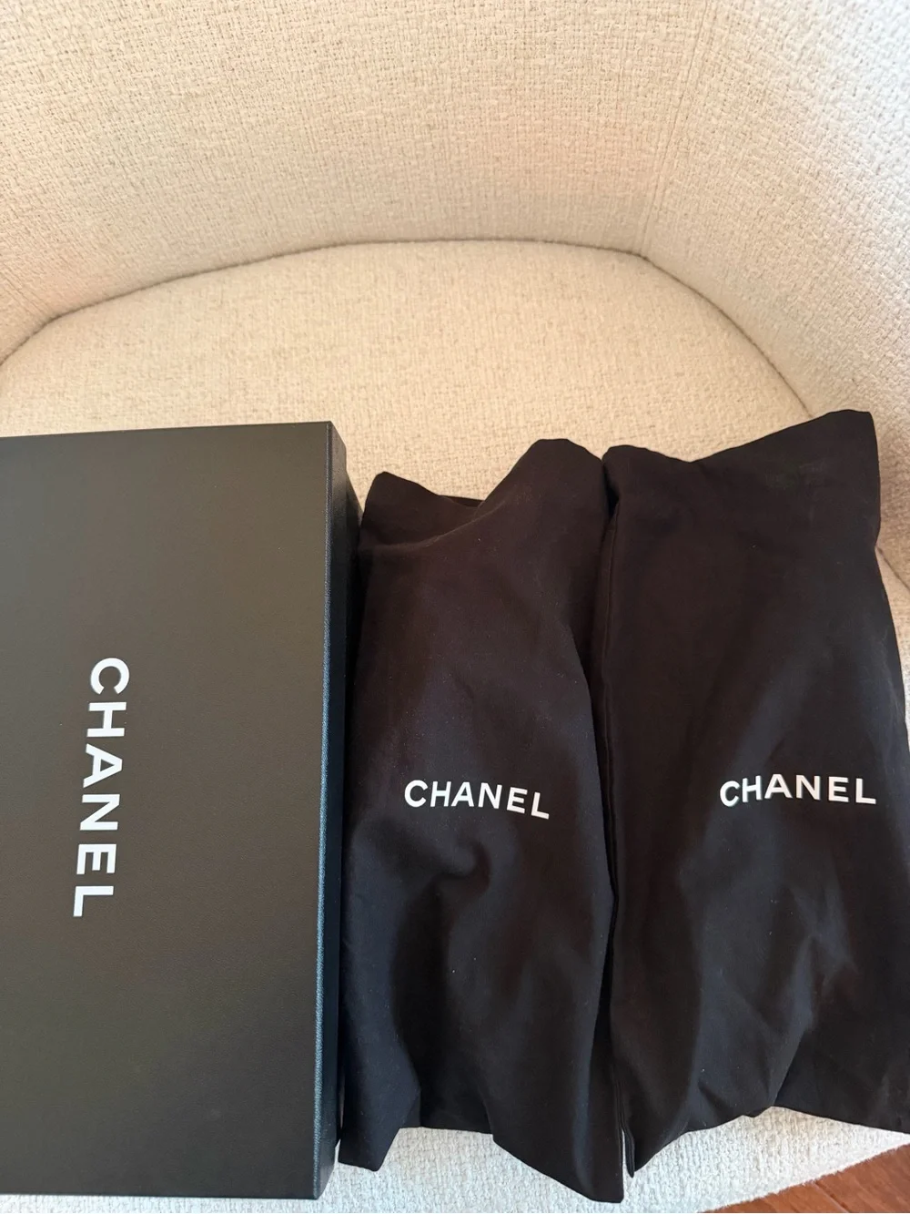 CHANEL Black Leather Ballet Flats with Patent Cap Toe